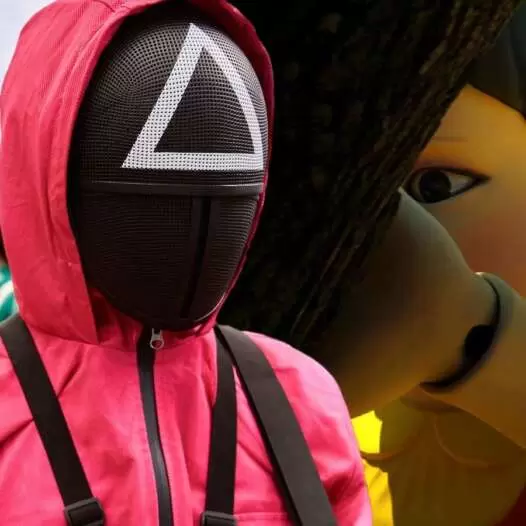 squid game guard and doll 1800x900